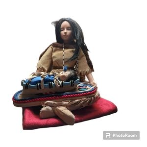 Native American porcelain doll with baby